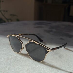 Stylish Dior Sunglasses with Gold and Black leather Accents